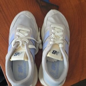 New Balance Women's Sneakers in White and Light Blue